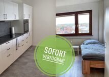 Küche und Schlafzimmer