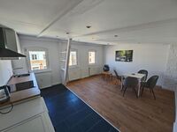 Neu saniertes Penthouse Apartment mit offener Wohnküche Bild 2