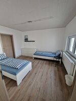 Moderne Wohnung mit Monteurzimmer im Neubau in Kraichtal Bild 2