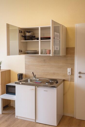 35 Zimmer (EZ/DZ) & 15 Apartments | WLAN | Küche | Zentrale Lage | Ruhig Bild 5