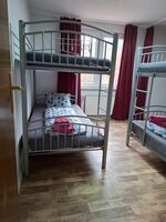 Ferienwohnungen mit Einzelbetten ,private Bäder, Küche Bild 15