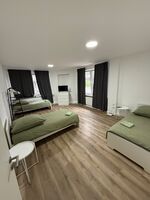 Wohnzimmer mit 3 Einzelbetten