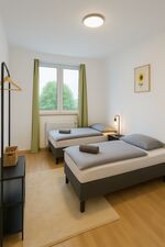 Modernes Apartment im Zentrum + Parkplätze Bild 12