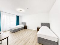 Apartments | WLAN, Smart TV, Küche, WM, Trockner, Parkplätze (LKW) Bild 14