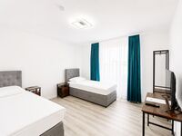 Apartments | WLAN, Smart TV, Küche, WM, Trockner, Parkplätze (LKW) Bild 13