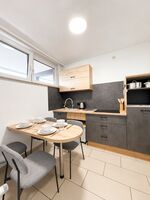 Apartments | WLAN, Smart TV, Küche, WM, Trockner, Parkplätze (LKW) Bild 16