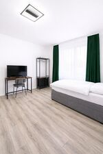 Apartments | WLAN, Smart TV, Küche, WM, Trockner, Parkplätze (LKW) Bild 11