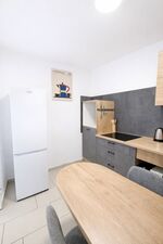 Apartments | WLAN, Smart TV, Küche, WM, Trockner, Parkplätze (LKW) Bild 18