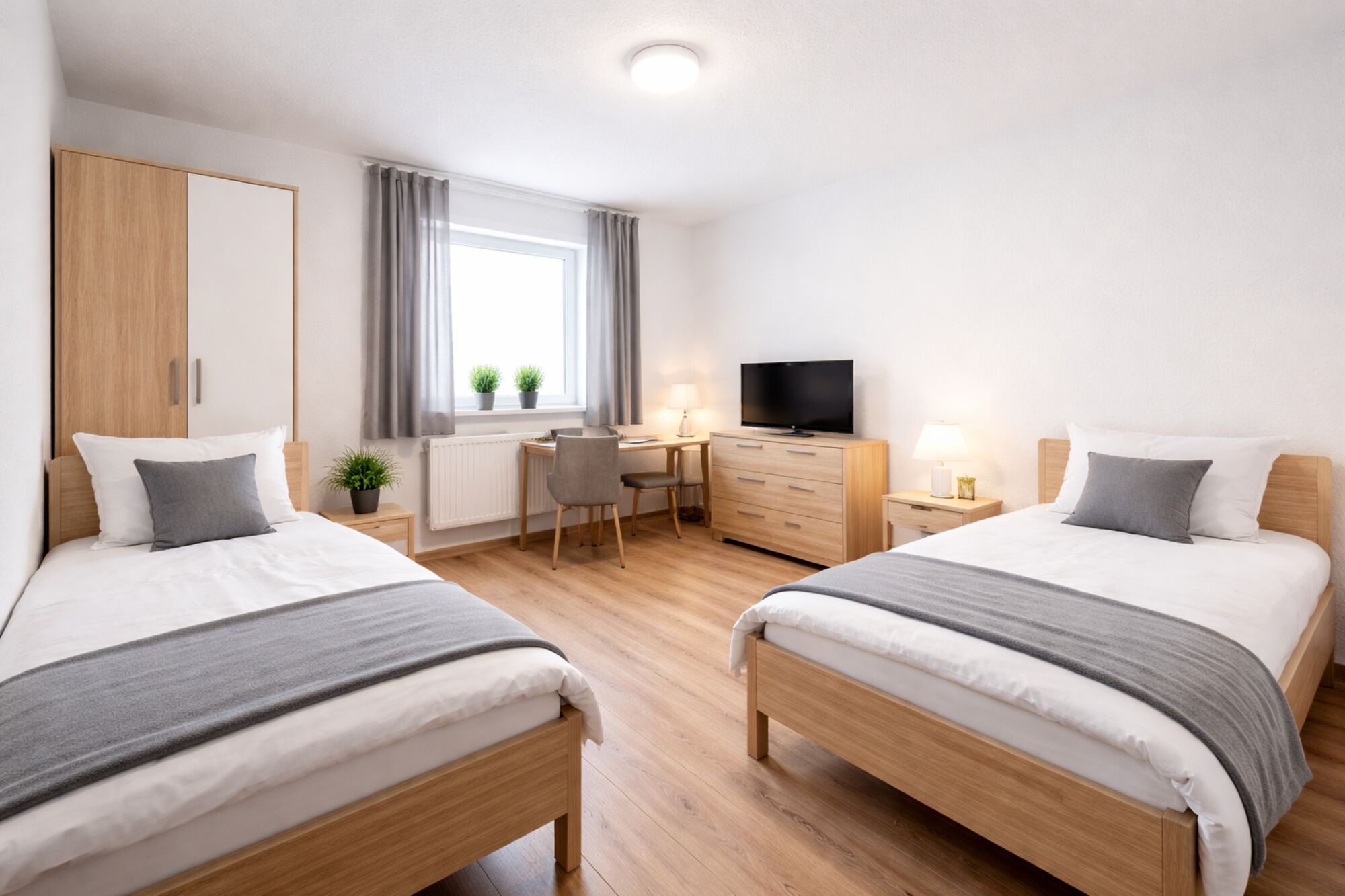 Schlafzimmer 2 mit zwei Einzelbetten