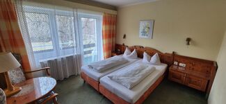 Einzel-/ Doppelzimmer mit eigenem Bad