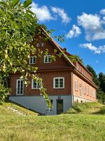 Berghaus über dem See - Herberge im Hoff Schawernack Bild 1