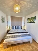 Gemütliche Wohnung mit Holzkamin Bild 1