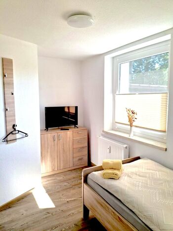 3 Einzelzimmer / Wohnküche / Grillplatz Bild 5