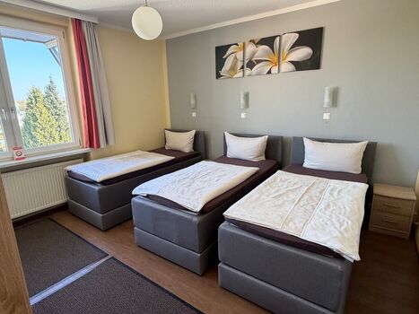 Dreibettzimmer