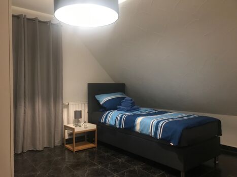 Großzügige Wohnung mit Parkplätzen und Garten/Terrasse