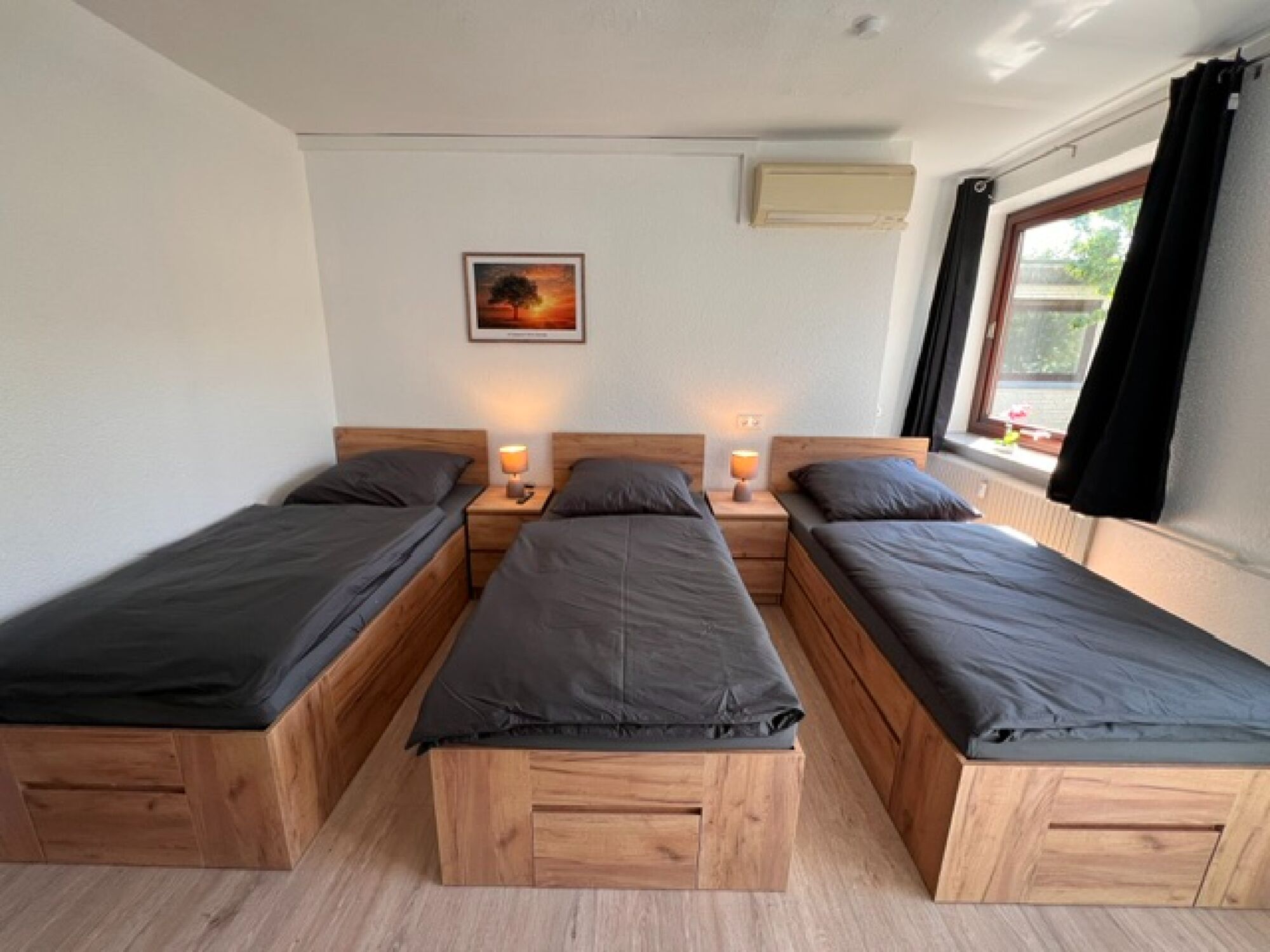 Schlafzimmer mit 3 Einzelbetten