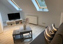 Schlafzimmer 4 mit Schlafsofa und TV