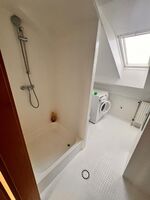 Bad mit Dusche und WC