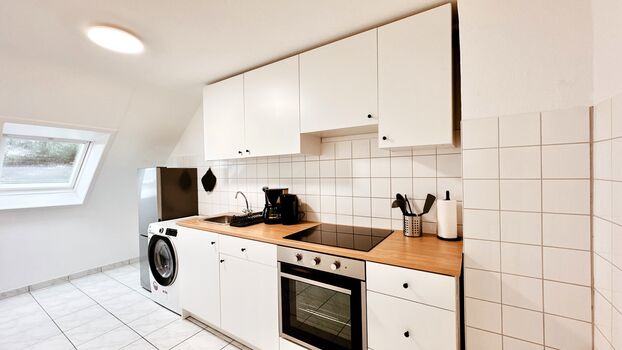 Monteurwohnung mit Balkon und Wohnzimmer Bild 3