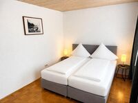 Große Wohnung: eines der 4 Schlafzimmer.