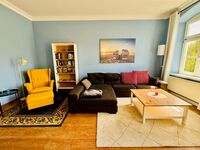 Wohnzimmer mit Schlafsofa