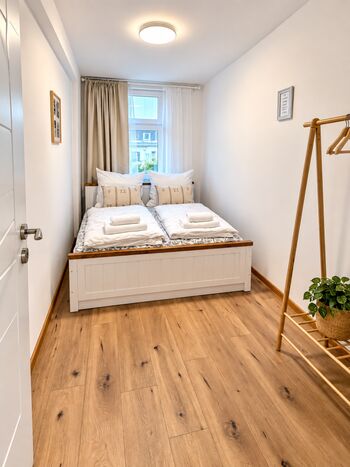 Einzelzimmer mit Queensize Bett