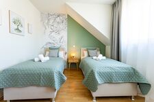 Schlafzimmer UG mit getrennten Betten