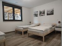 Schlafzimmer mit 3 Einzelbetten