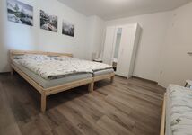 Schlafzimmer mit 3 Einzelbetten