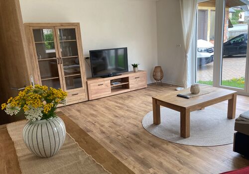 Wohnzimmer mit ausziehbaren Sofa