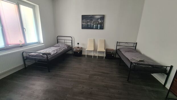 Schlafzimmer 1 mit 2 Einzelbetten