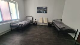 Schlafzimmer 1 mit 2 Einzelbetten