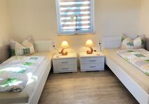 Schlafzimmer mit 2 Single Betten