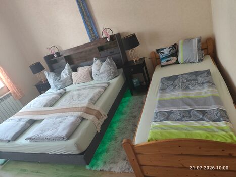Schlafzimmer 1 mit einem extra Bett