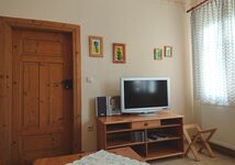 Das Wohnzimmer mit TV und Radio / Player