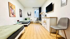 Schlafzimmer 3 - 2 Einzelbetten / TV / Kommode / Garderobe