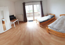 Schlafzimmer mit Balkon, Haus A