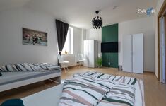 Schlafzimmer 3 mit zwei Einzelbetten, Sitzecke und Smart TV