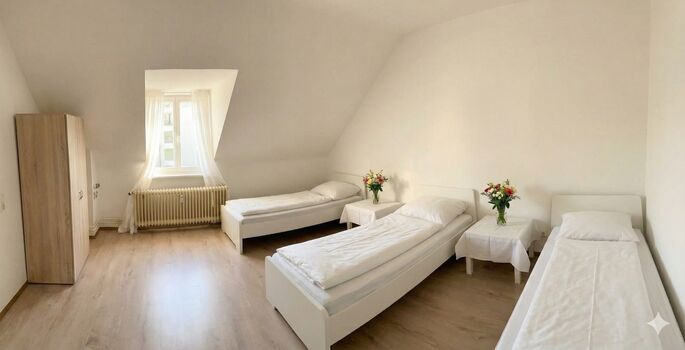 Drei Bett Zimmer