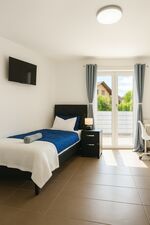 Monteurzimmer LETA Homes Rent and Stay Bild 23