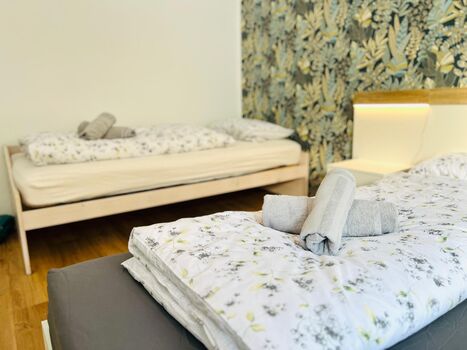 Doppelbett und Einzelbett