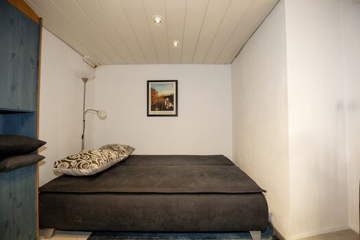 Aufgeklappte Schlafcouch