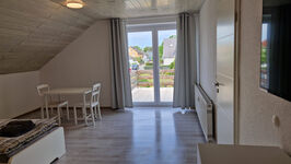 Zimmer mit Balkon