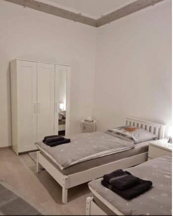 Wohnung 1: 2 Einzelbetten (Schlafzimmer 1)