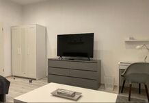 Wohnung 2: 1 Doppelbett (Schlaf-/Wohnzimmer) 