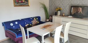 Wohnzimmer mit Schlafsofa
