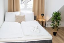 Schlafzimmer 2 mit einem Doppelbett