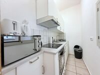 Top ausgestattete Team-Apartments Neumünster – ideal für Fir Bild 4