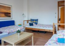 3-Bett-Schlafzimmer