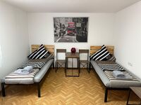 ARCOS - 2 Wohnungen im EG und OG für bis zum 16 Personen Bild 1